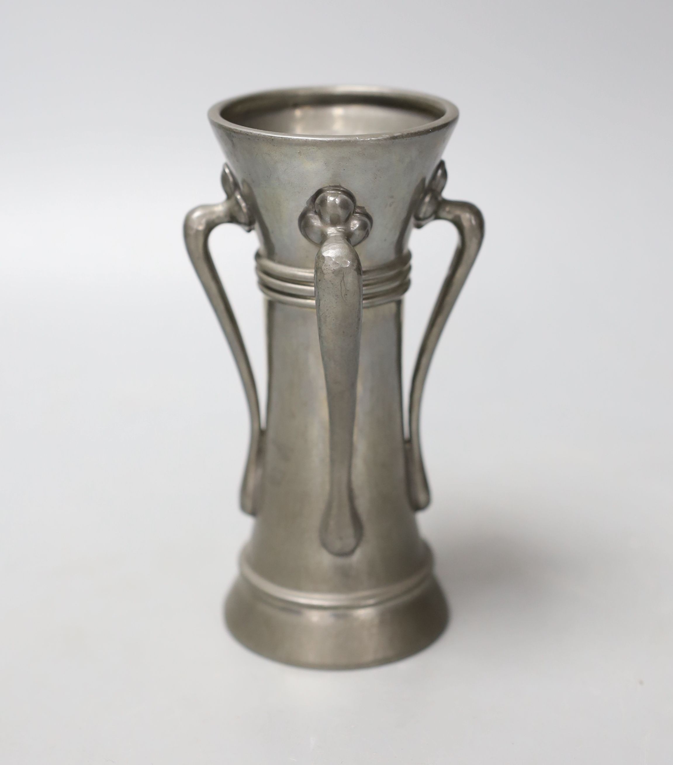 A Liberty’s Tudric pewter four-handled vase designed by Archibald Knox, shape 01214, 14cm. *This lot is being sold in aid of Prostate Cancer UK with 100% of the hammer price going to the charity”